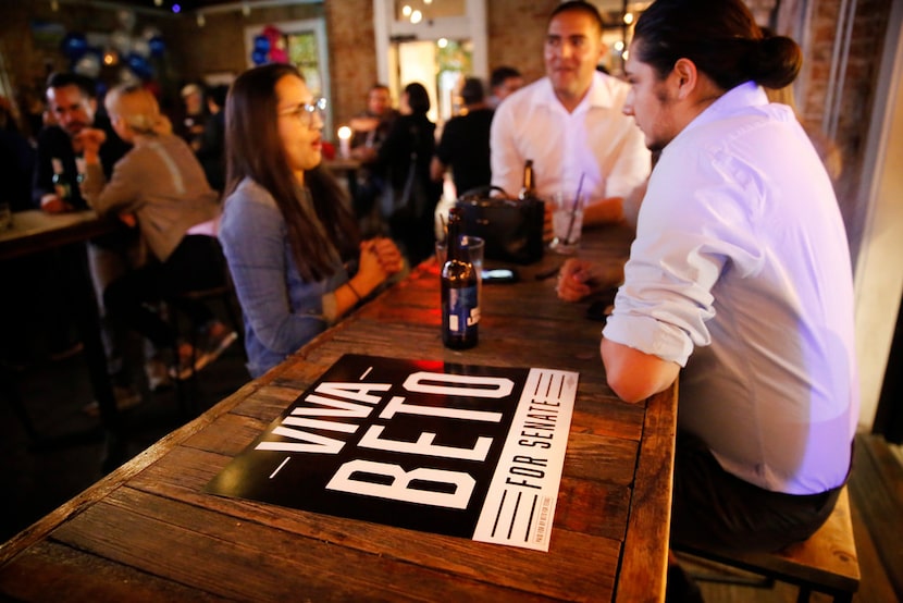 From left, Berenice Sigala, Julio Diaz  ad Jonathan Garza discuss Beto O'Rourke's defeat,...