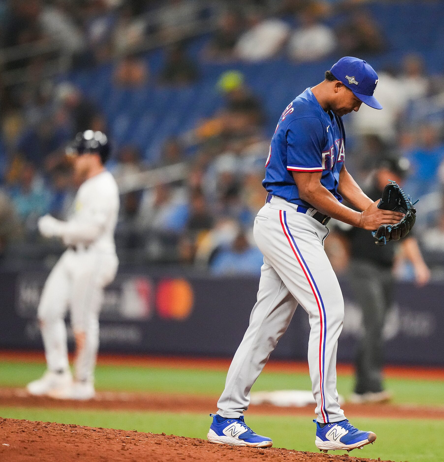 Texas Rangers relief pitcher Jose Leclerc celebrates after the final out of a victory over...