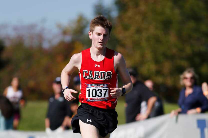 Fort Worth Christian's Carter Cheeseman makes his way to the finish line to win the Class 5A...