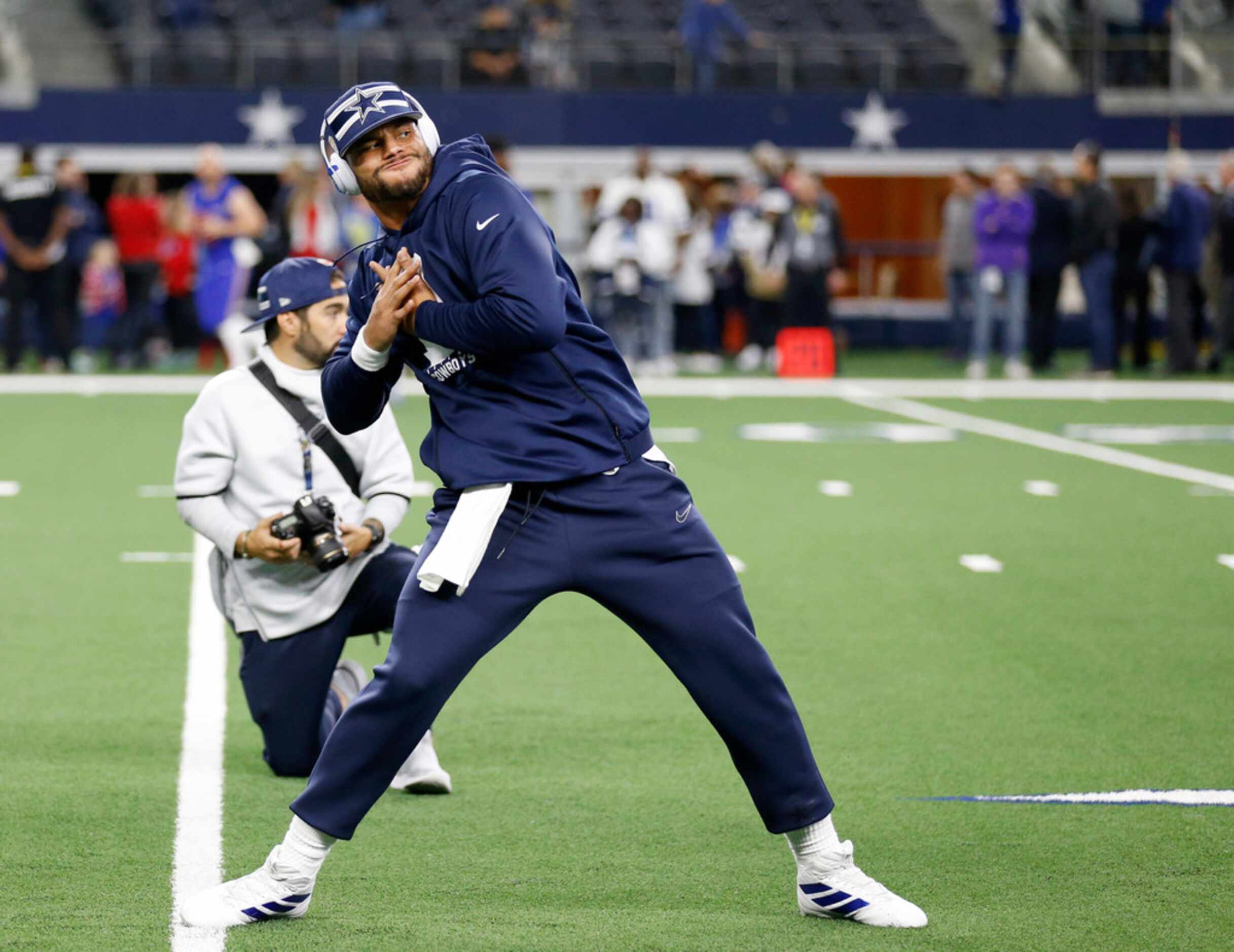 Dallas Cowboys quarterback Dak Prescott (4) stretches before a game against the Buffalo...