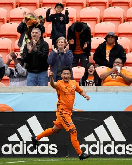 Houston Dynamo's Memo Rodriguez celebrates after scoring a goal against the Vancouver...