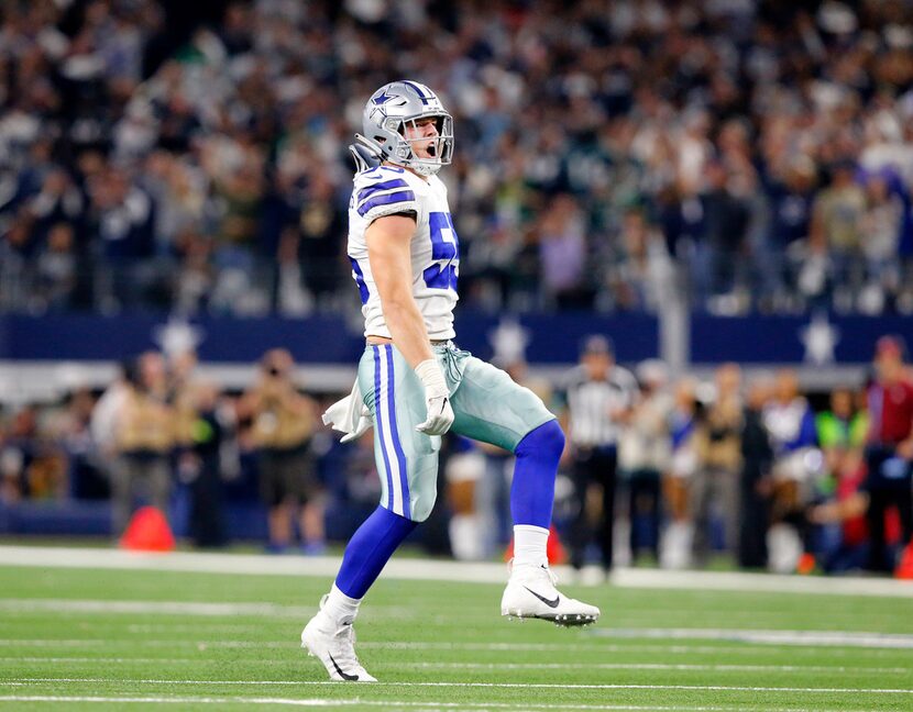 Dallas Cowboys outside linebacker Leighton Vander Esch (55) celebrates after making a fourth...