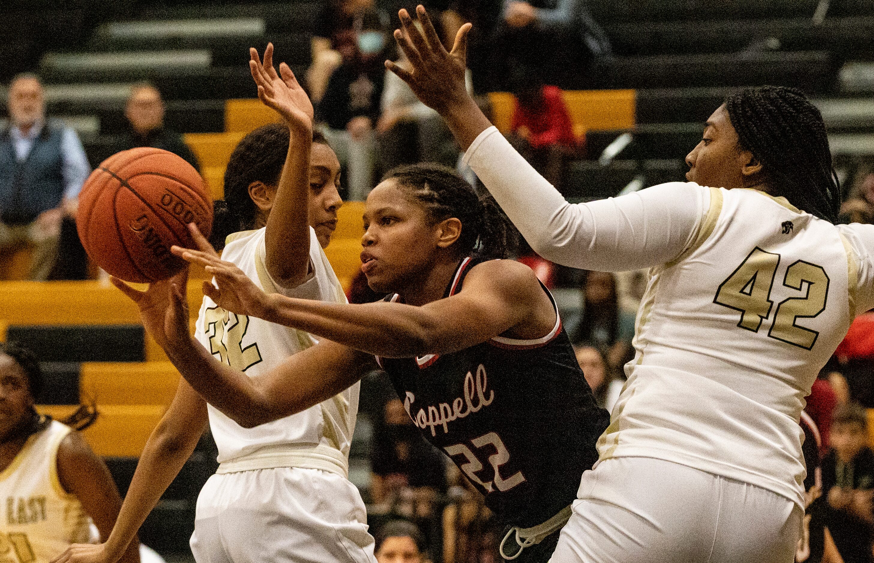 Coppell High School India Howard (22) passes the ball in the second half of the game in...