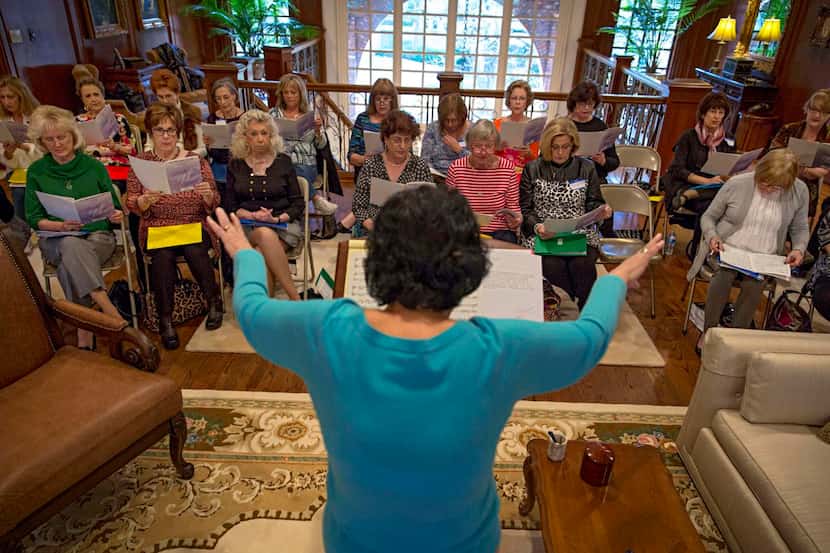 
Mary Bush, director of the Mary Notes Singing Group, leads practice in North Dallas. For...