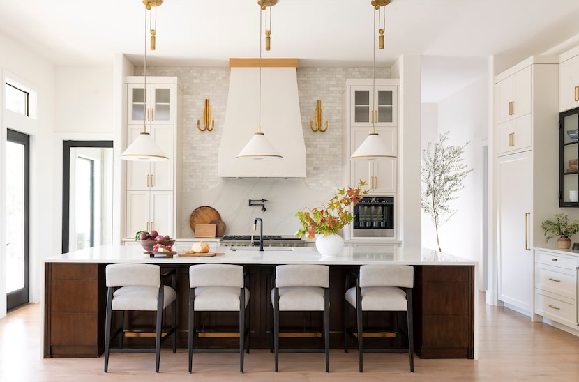 Kitchen with walnut island and white features