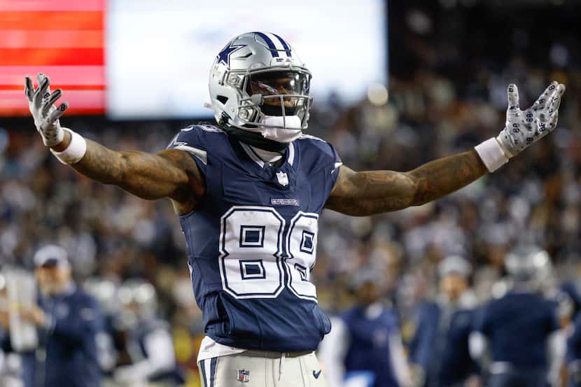 Dallas Cowboys wide receiver CeeDee Lamb (88) celebrates his touchdown during the first half...