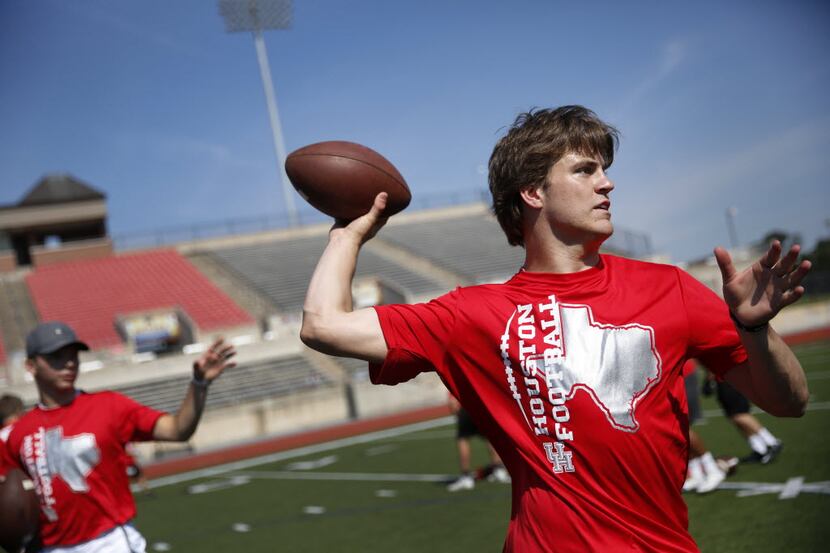Coppell quarterback Brady McBride shows his throwing skills during the University of Houston...