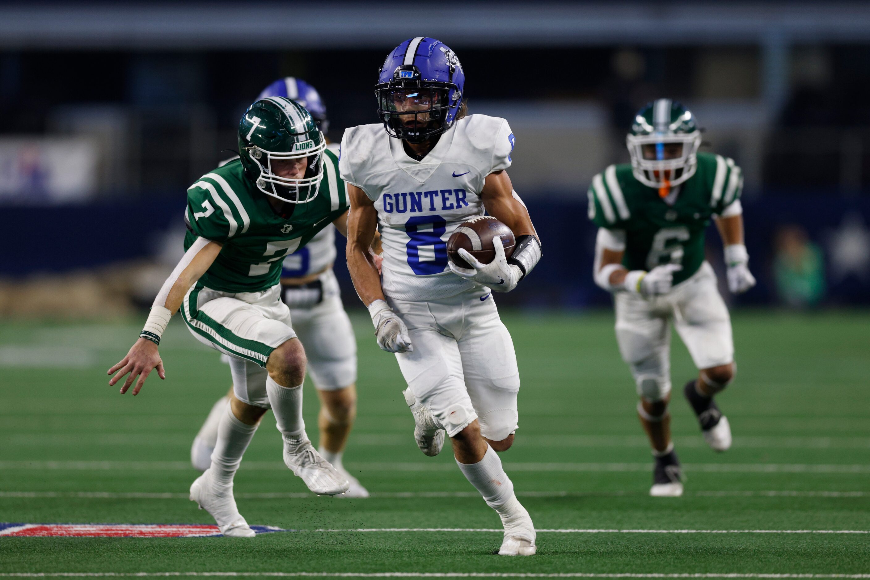 Gunter running back Ethan Sloan (8) runs past Franklin linebacker Seth Shamblin (7) during...