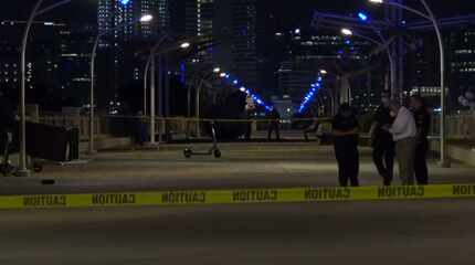 Dallas Police detectives on the scene of an early morning shooting on Saturday, July 11, on...