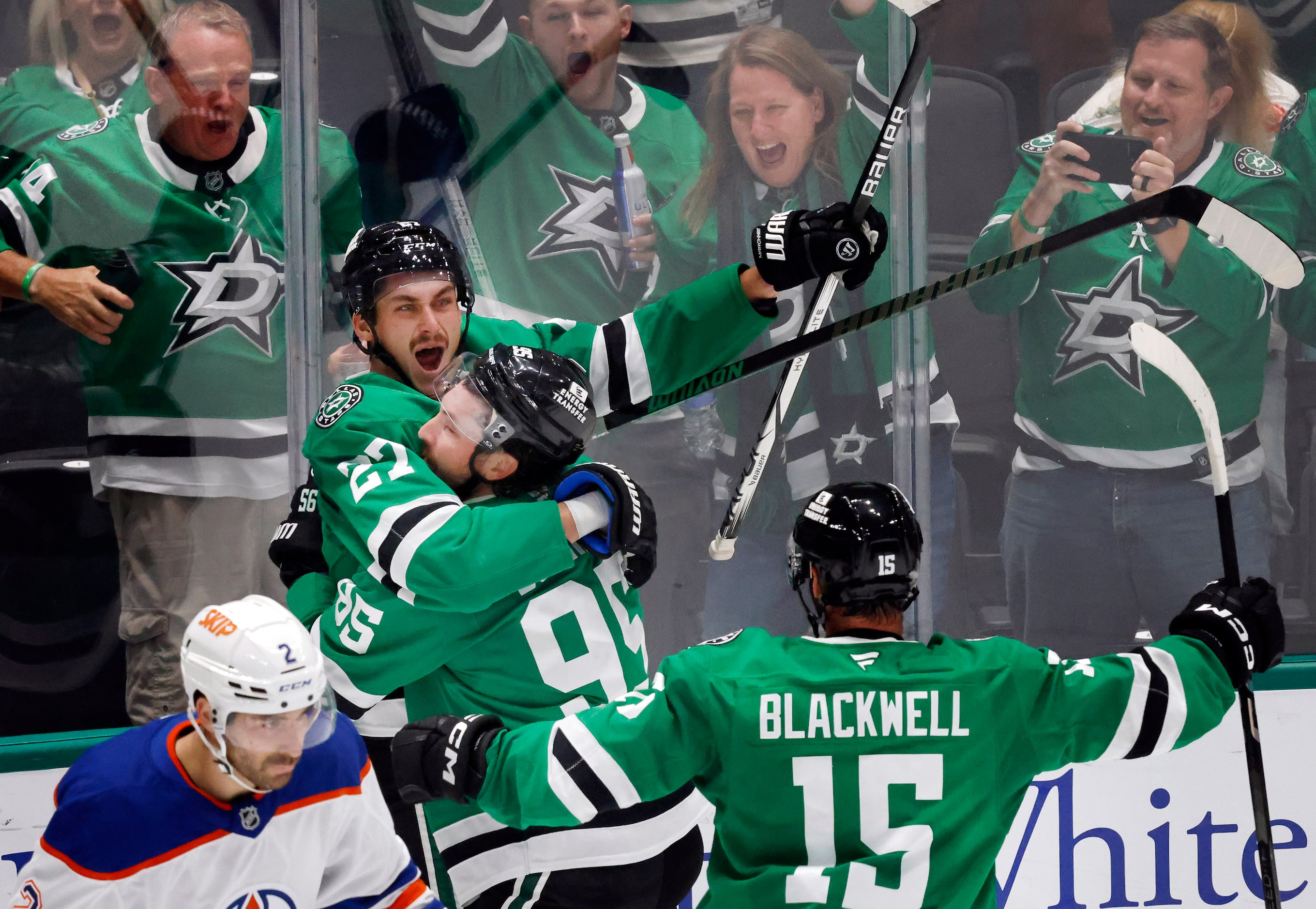 Dallas Stars left wing Mason Marchment (27) congratulates center Matt Duchene (95) on his...