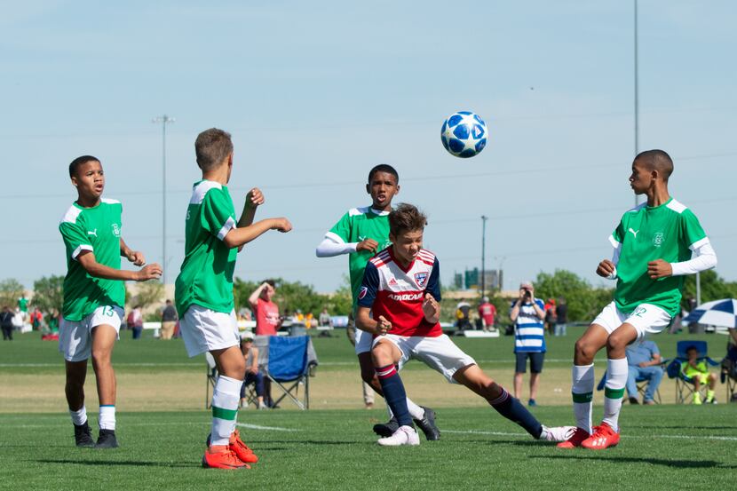Nighte Pickering heads the ball against Ikapa United in the 2019 Dallas Cup Super 14s.