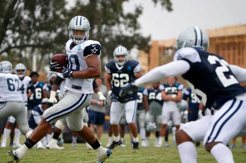 Dallas Cowboys tight end Rico Gathers (80) looks up for a running room after a catch during...