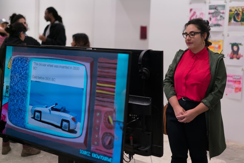 Guests browsed the "ME^2" exhibition at SMU’s Pollock Gallery on March 13.