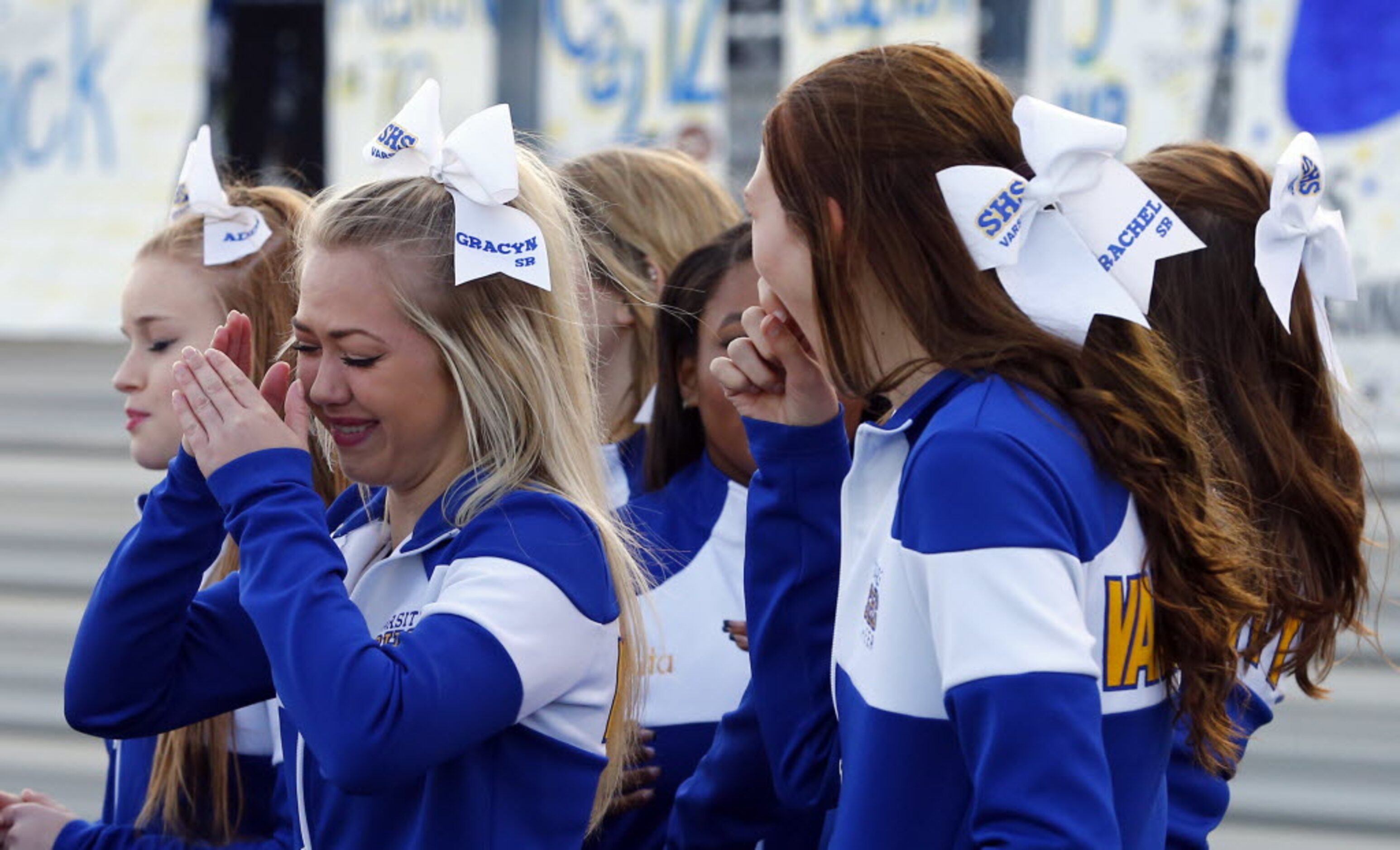 TXHSFB Sunnyvale cheerleader Gracyn Davis, on left, is overcome with emotion following their...