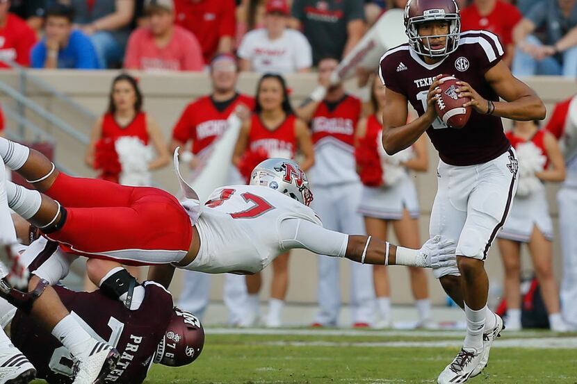 COLLEGE STATION, TX - SEPTEMBER 09:  Kellen Mond #11 of the Texas A&M Aggies scrambles out...
