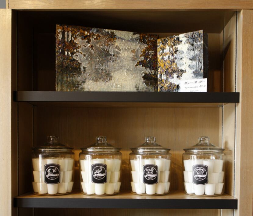 Curated, a new shop on McKinney Ave., photographed June 24, 2013. Candles and art are...