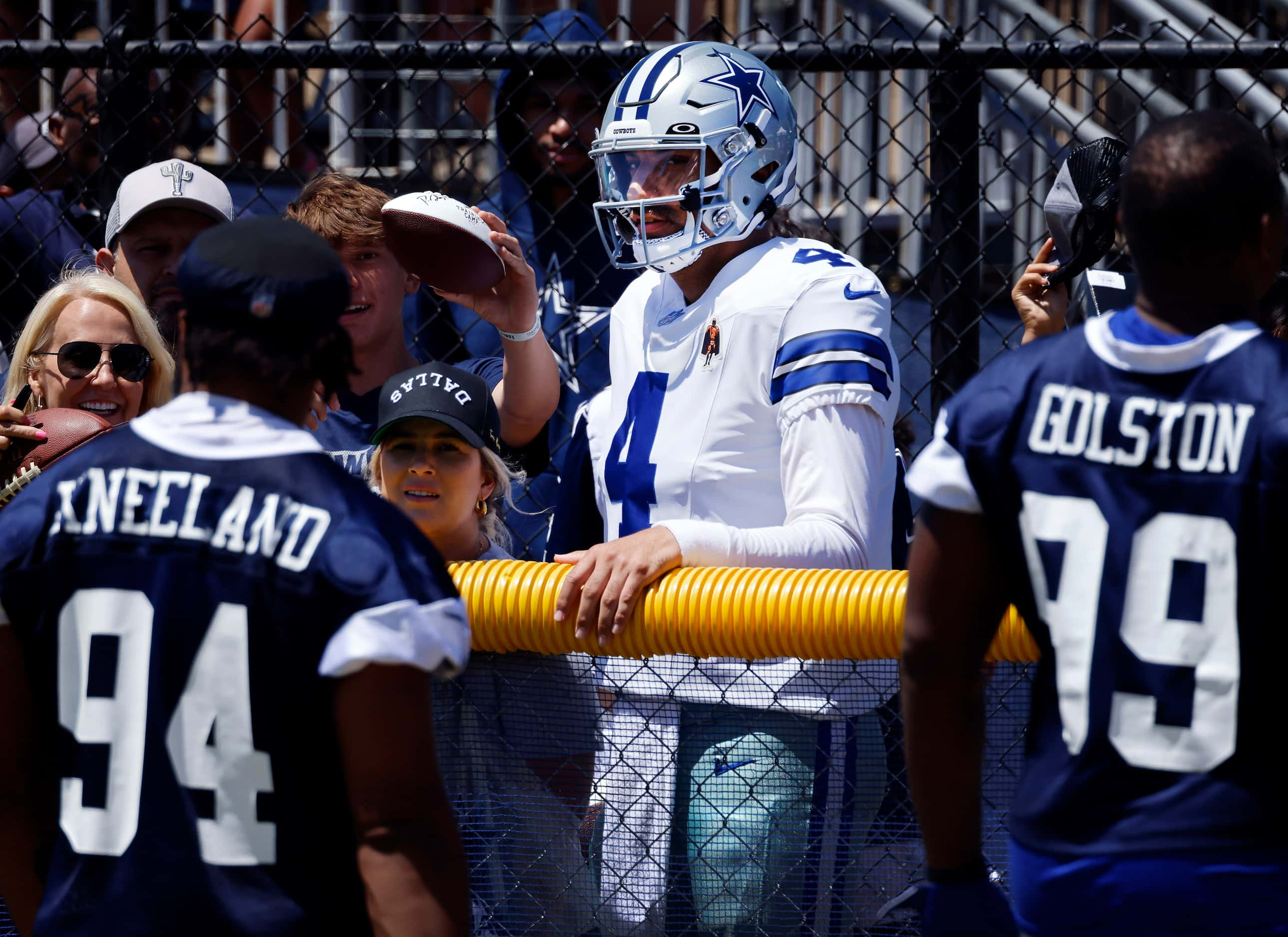 Dallas Cowboys fan Marcel Montalban dressed in full uniform of his favorite player,...