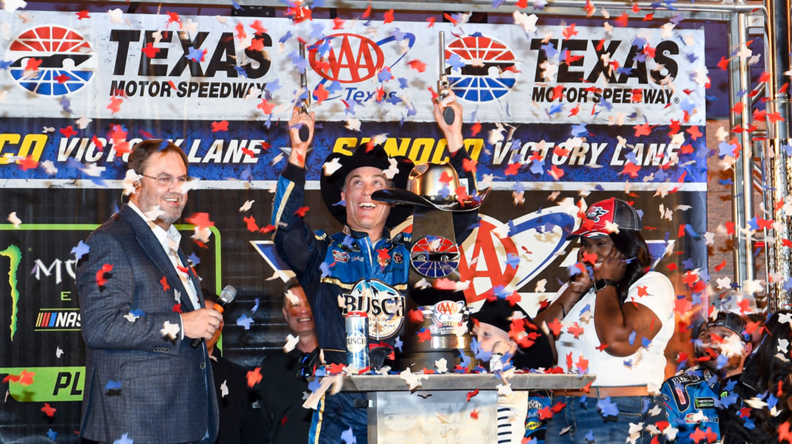 Kevin Harvick celebrates in Victory Lane after winning a NASCAR Cup Series auto race at...