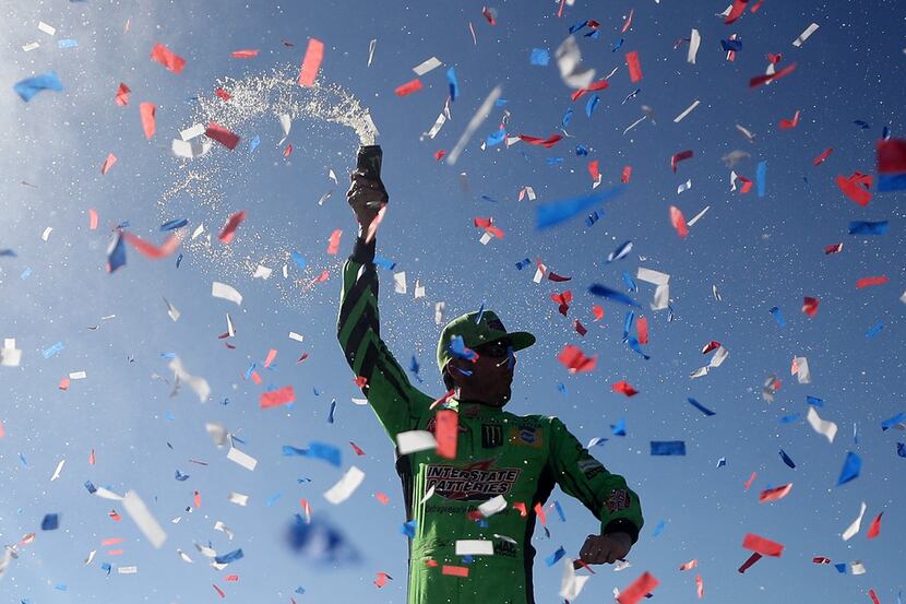 FONTANA, CA - MARCH 17:  Kyle Busch, driver of the #18 Interstate Batteries Toyota,...