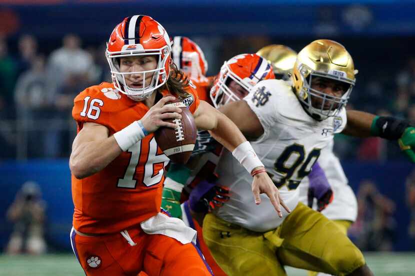 Clemson quarterback Trevor Lawrence scrambled out of the pocket during the Cotton Bowl...