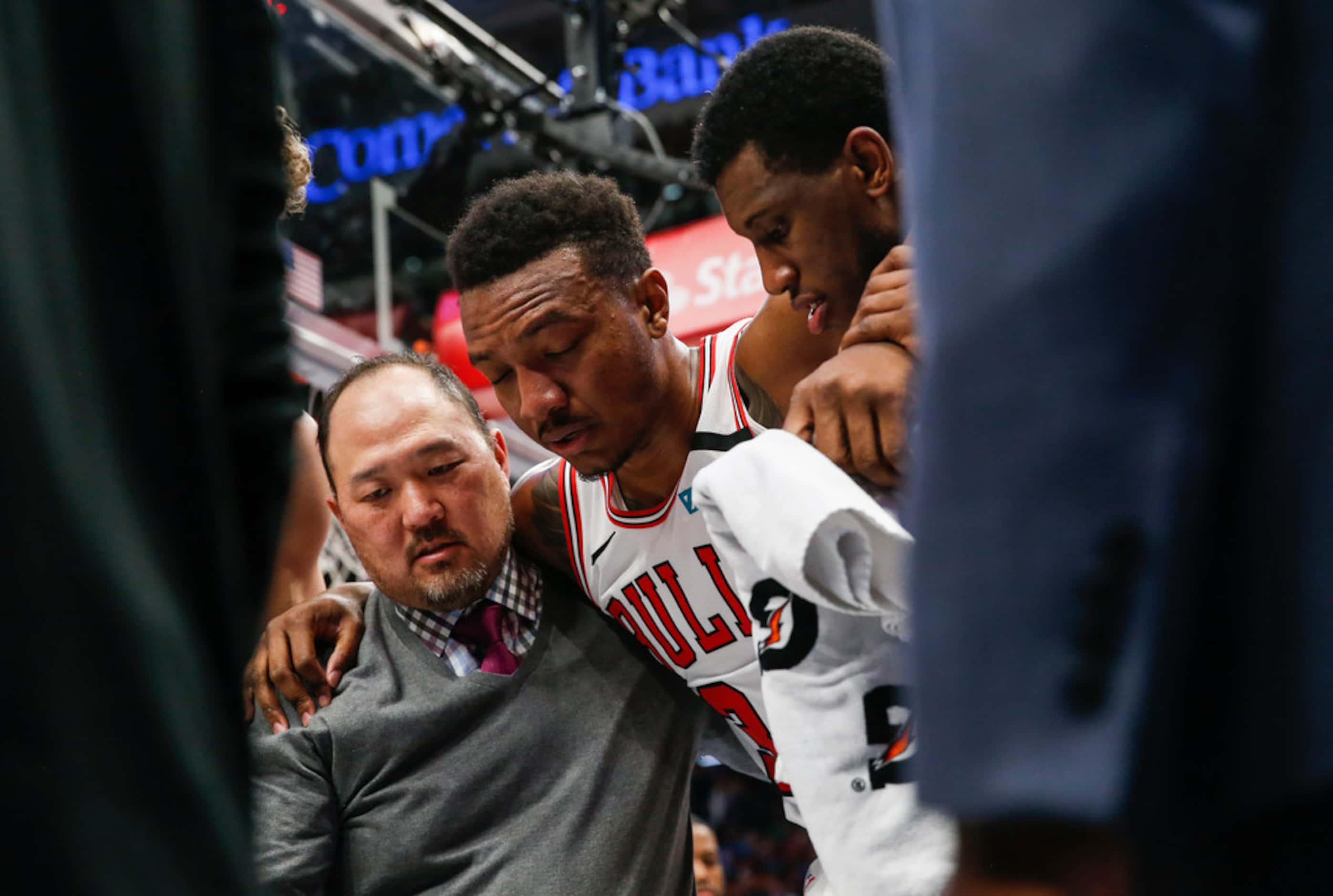 Chicago Bulls center Wendell Carter Jr. (34) is helped off the court after being injured...