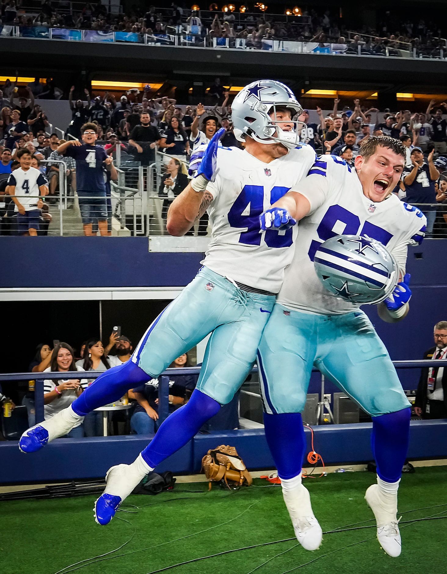 Dallas Cowboys tight end Peyton Hendershot (49) celebrates with defensive tackle John...