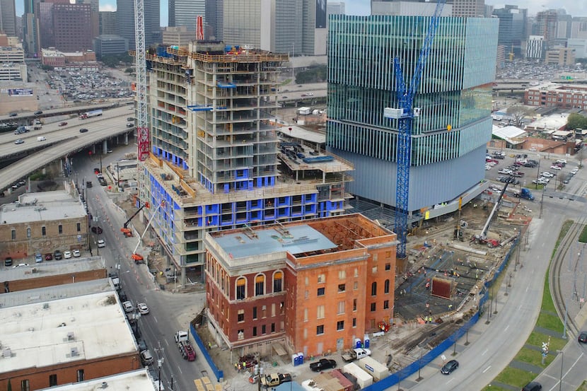 The Epic development under construction in Deep Ellum includes an office tower (offset...
