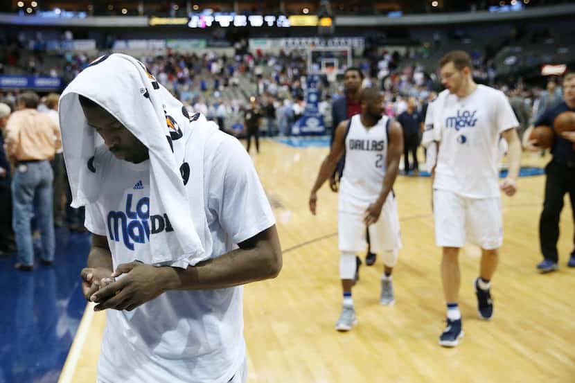 Dallas Mavericks guard Wesley Matthews (23) walks off the court after  a National Basketball...