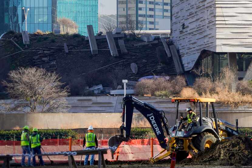 With the Perot Museum of Nature and Science (right) nearby, work progresses on a 2,000-space...