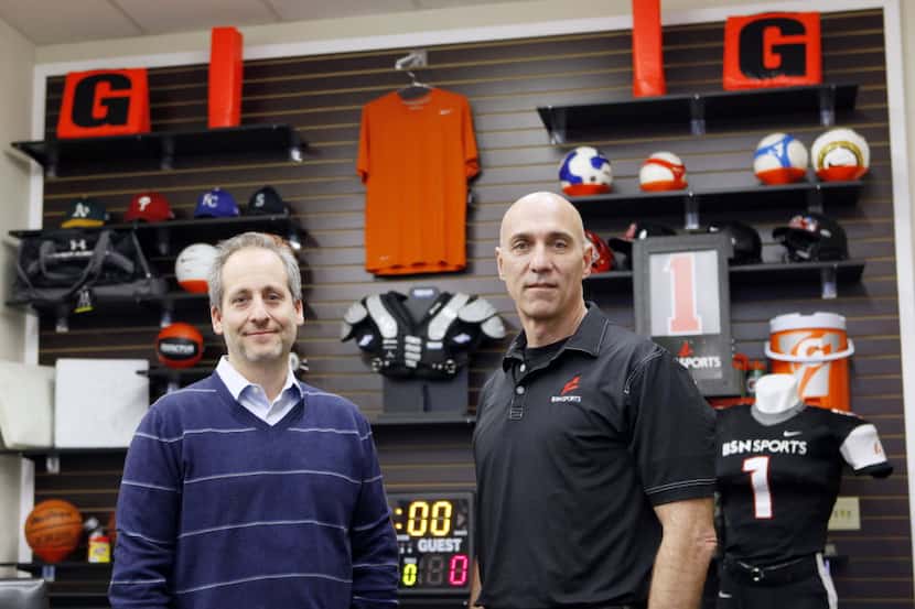 Varsity Brands CEO Adam Blumenfeld, left, and Terry Babilla, president of BSN Sports, one of...