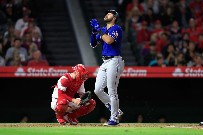 ANAHEIM, CA - SEPTEMBER 25:  Joey Gallo #13 of the Texas Rangers reacts to hitting a solo...