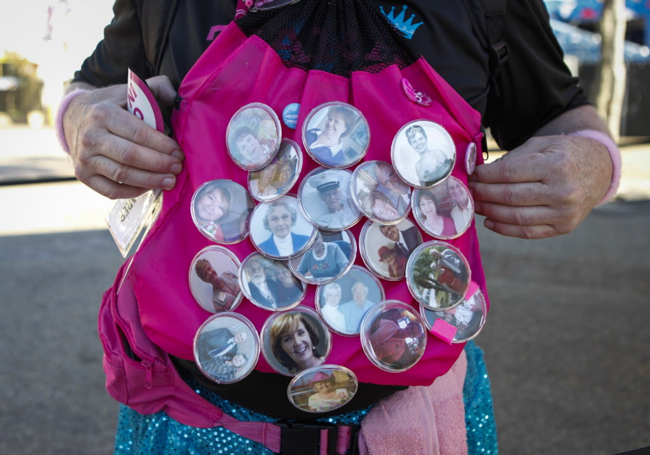 Mike Norwood of Brentwood, Tenn wore a photo button of all his friends and family members...