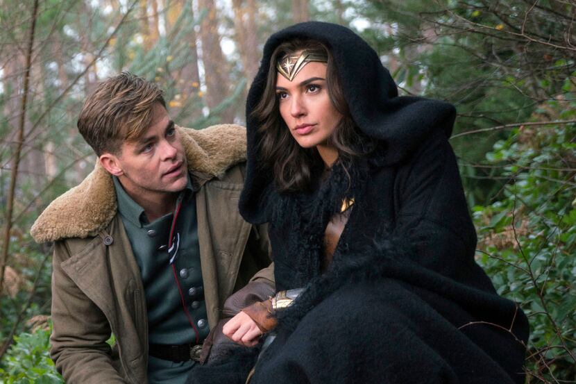 This image released by Warner Bros. Pictures shows Chris Pine, left, and Gal Gadot in a...