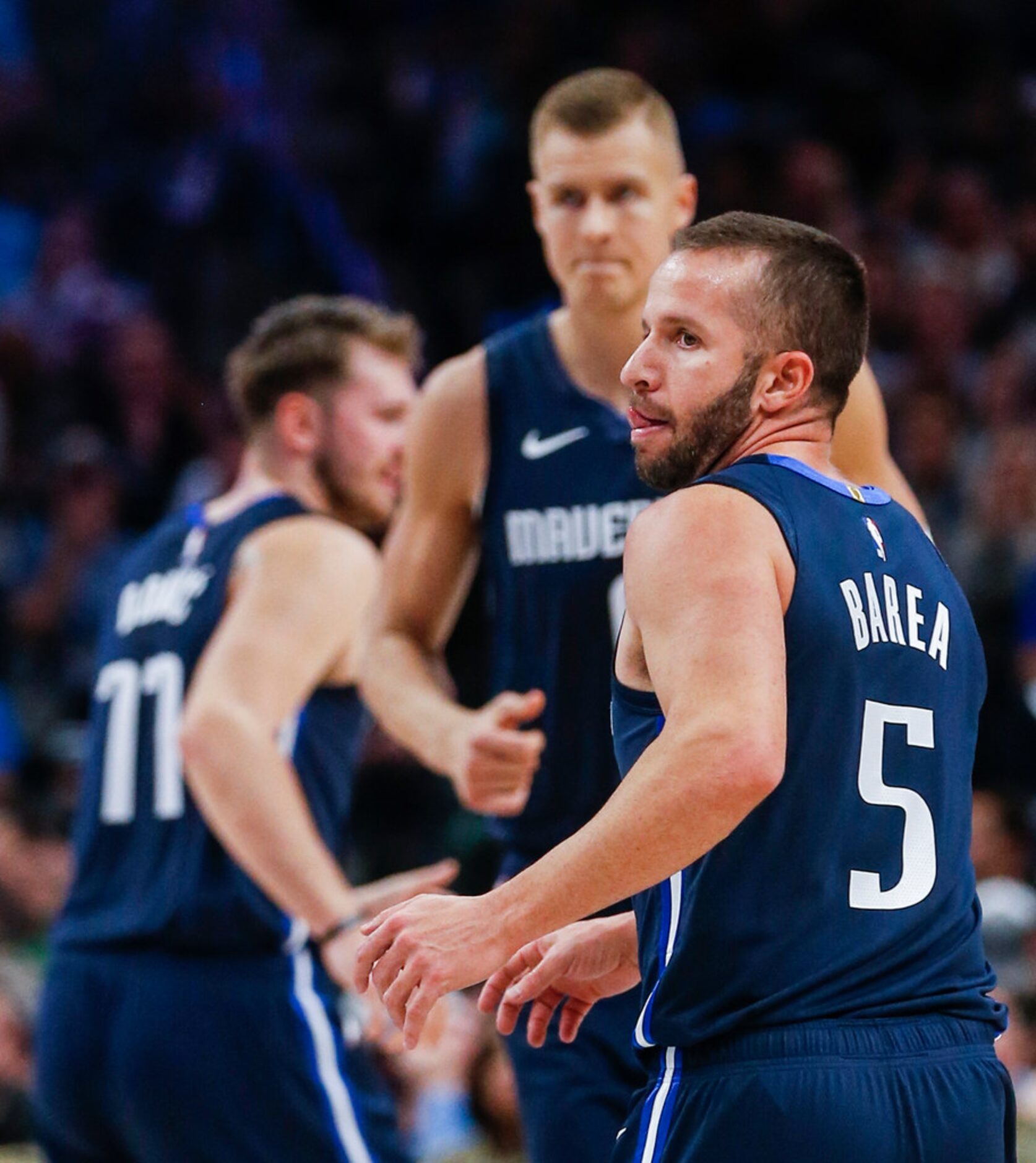 Dallas Mavericks guard J.J. Barea (5) looks downcourt during an NBA game between the Dallas...