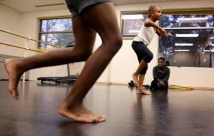  Children dance during an after-school program at St. Philip's School and Community Center....