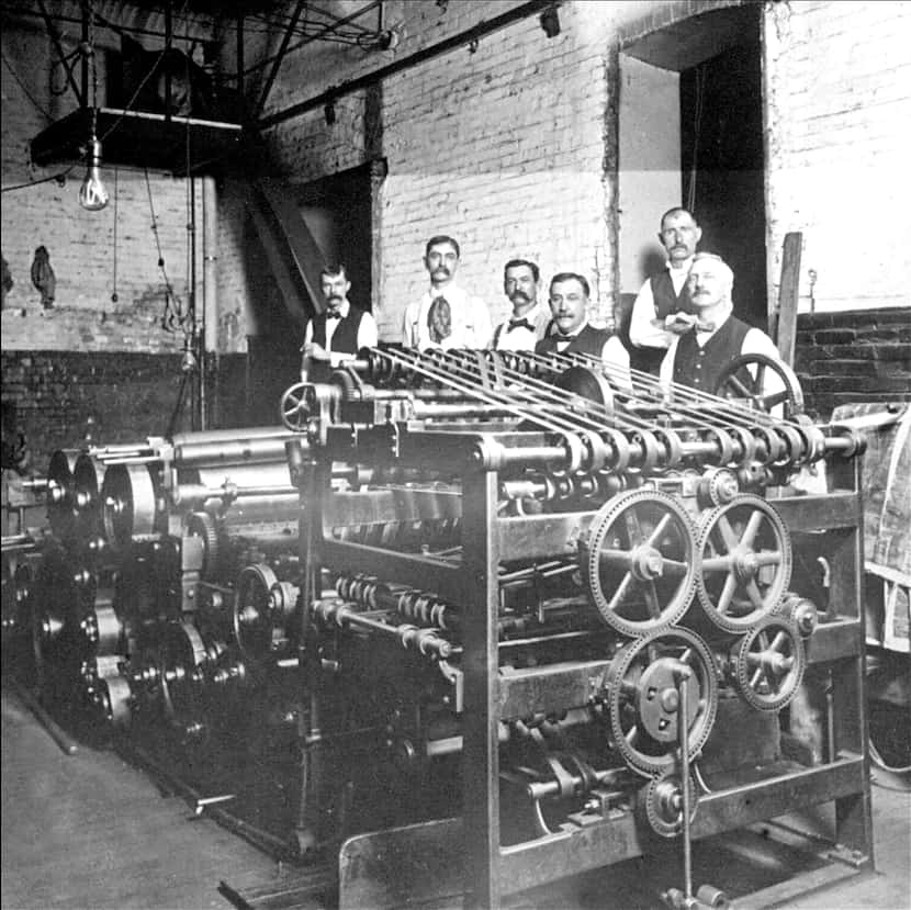 This Bullock press put out the first issue of The News in 1885.  G.B. Dealey is at the far...