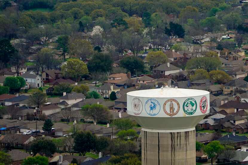 An aerial view of water tower and residential neighborhoods near West Mesquite High School.