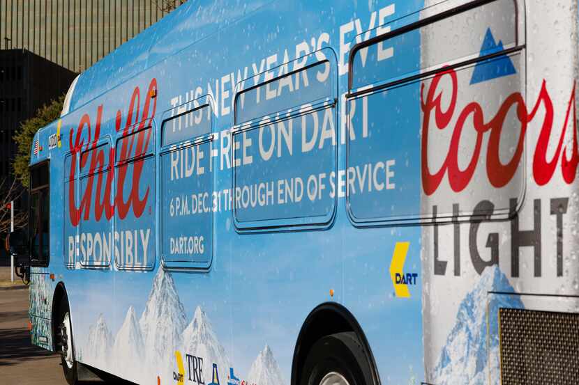 A Dallas Area Rapid Transit bus advertises the agency’s free services on New Year’s Eve in...