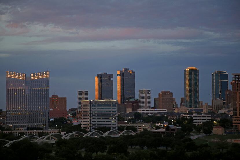 Part of the Fort Worth skyline at dusk, including the Paul Rudolph designed City Center...
