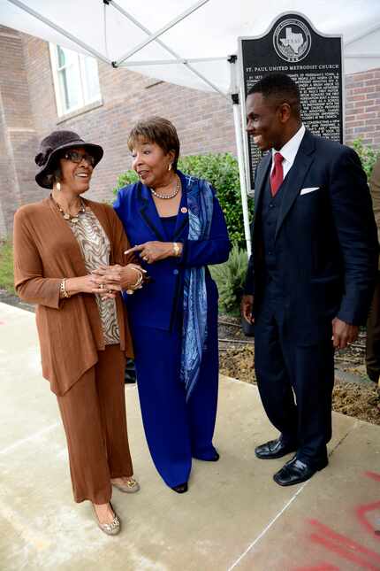 Pastor Richie Butler and Rep. Eddie Bernice Johnson (middle) talked to fourth-generation St....