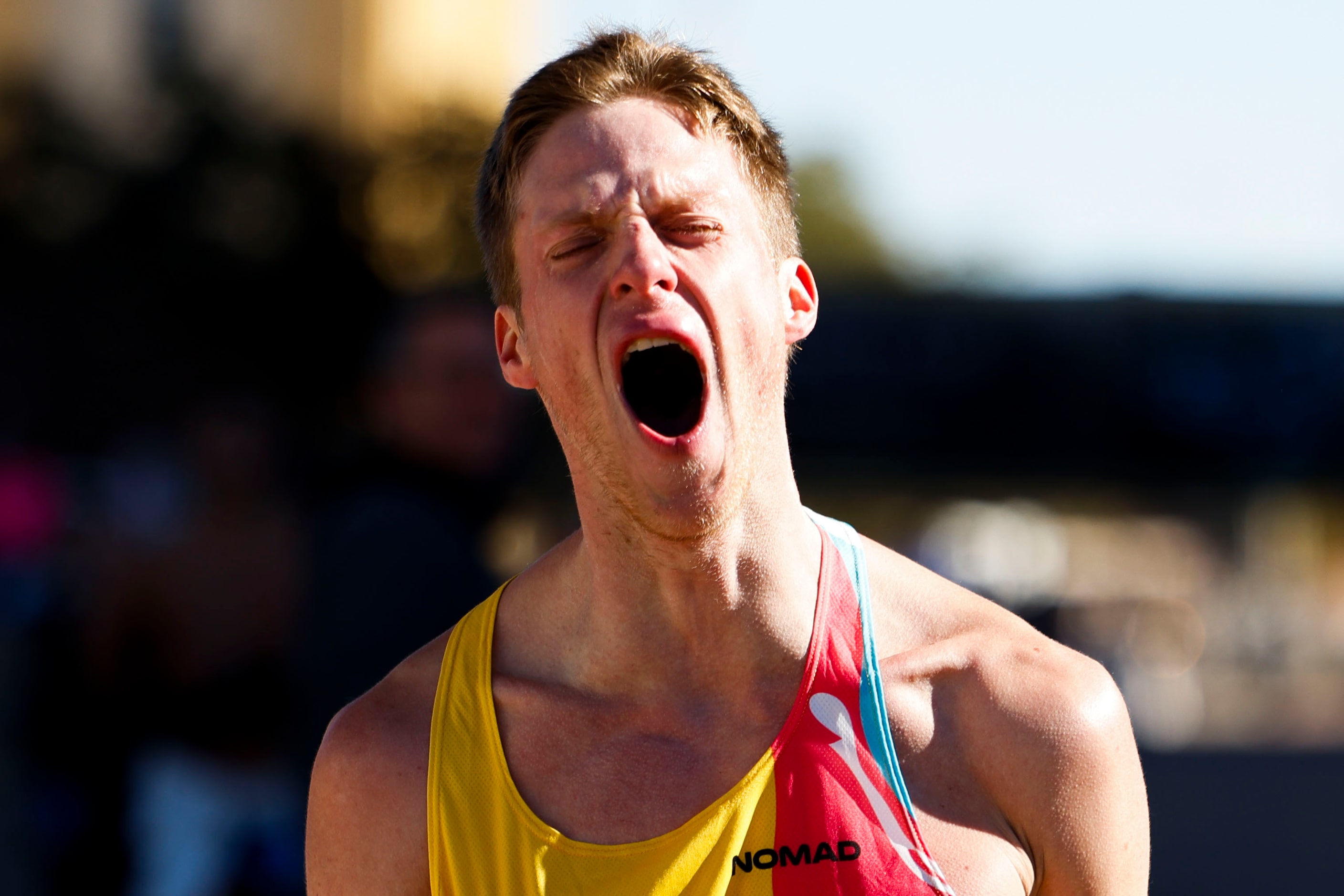 Men’s marathon finisher Joseph Hale, 30, of Grapevine, celebrates after reaching the finish...