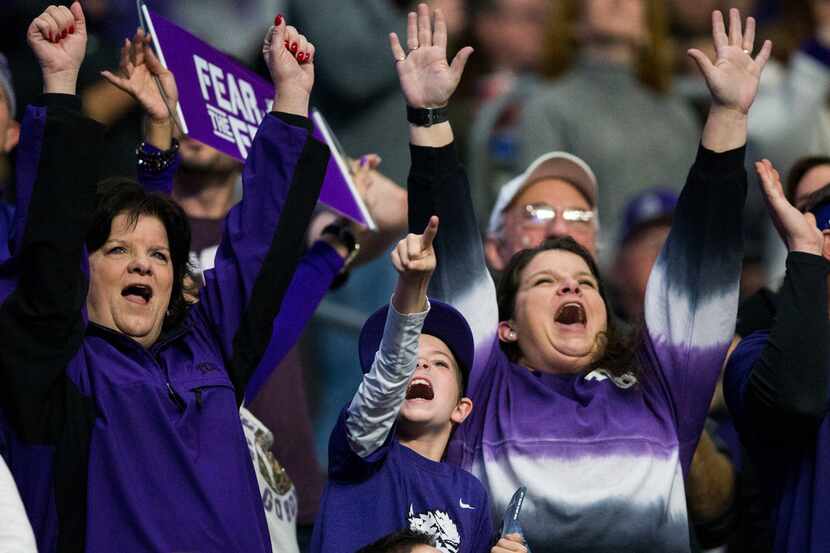 TCU Horned Frogs fans cheer during the second quarter of the Valero Alamo Bowl between TCU...