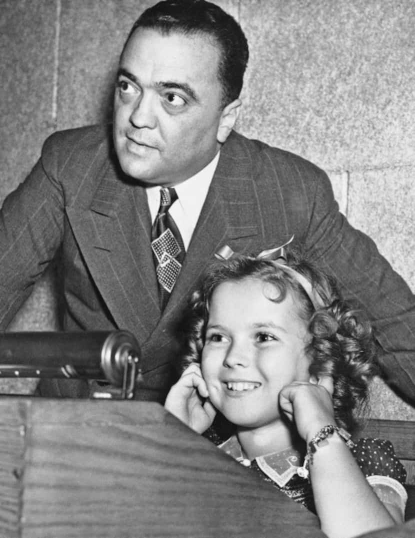 Temple plugged her ears as her father shot a federal agent's gun while FBI Director J. Edgar...