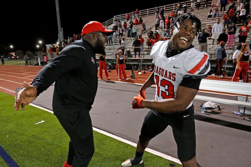 A coach and Mesquite horn and defender Armstrong Nnodim (13) celebrate his Nnodim’s “Pick...
