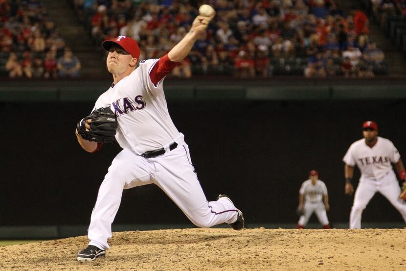 Texas relief pitcher Robbie Ross is pictured during the Texas Rangers vs. the Seattle...