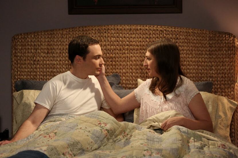 This image released by CBS shows Mayim Bialik, right, portrays Amy, and Jim Parsons portrays...