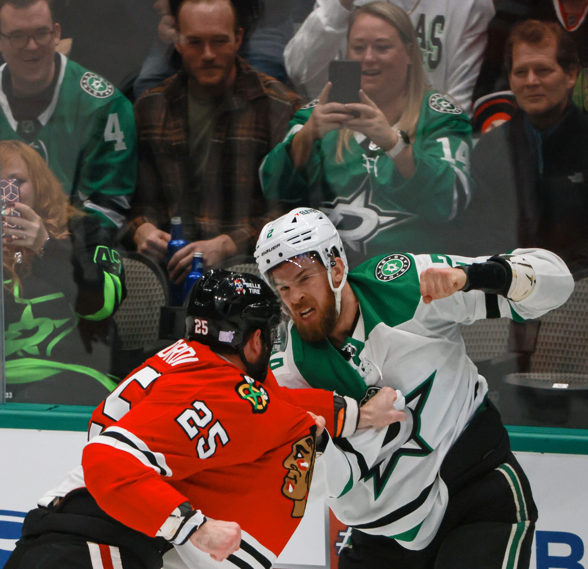 Chicago Blackhawks defenseman Jarred Tinordi (25) and Dallas Stars defenseman Jani Hakanpaa...