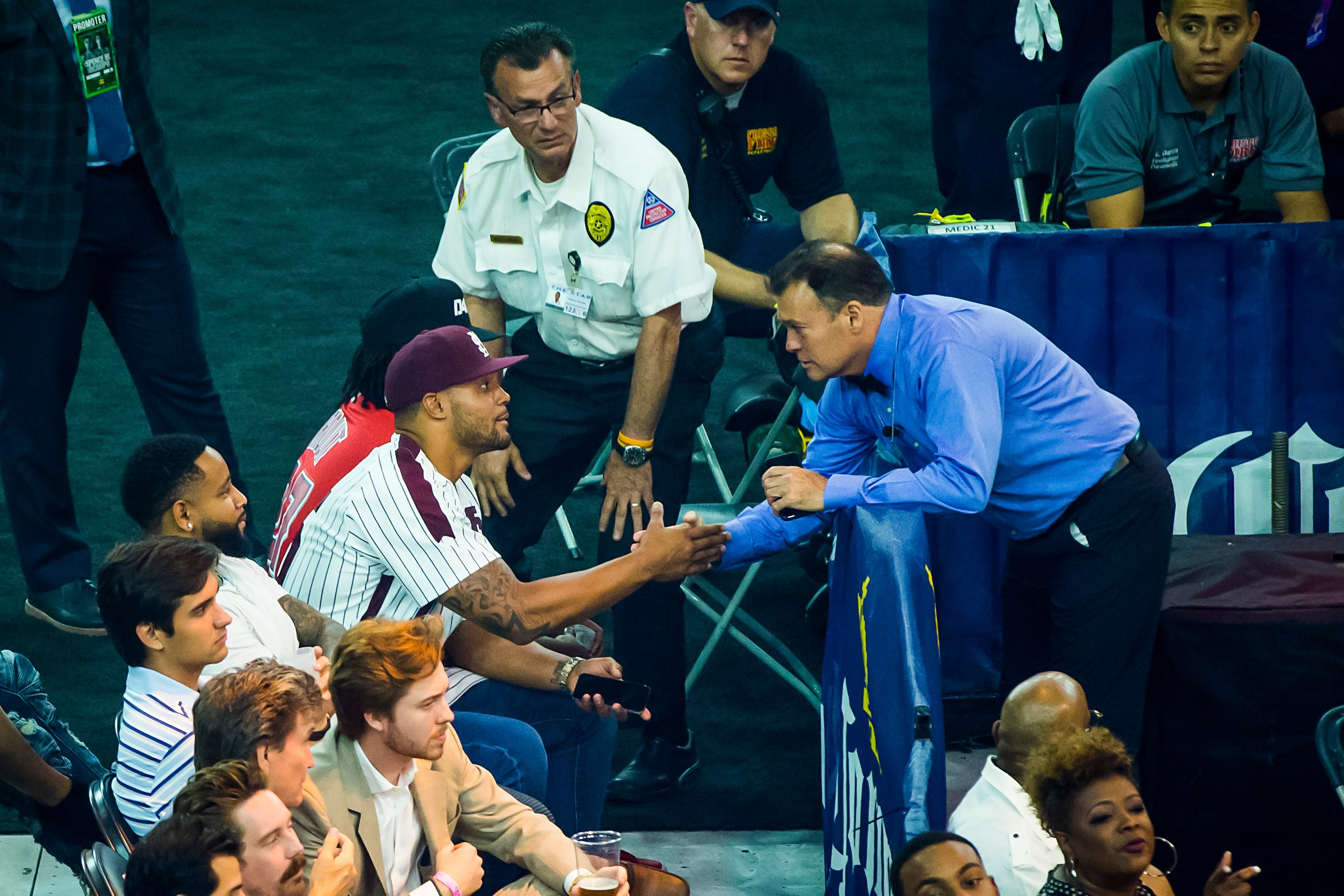 Dallas Cowboys quarterback Dak Prescott shakes hands with Referee Laurence Cole before...