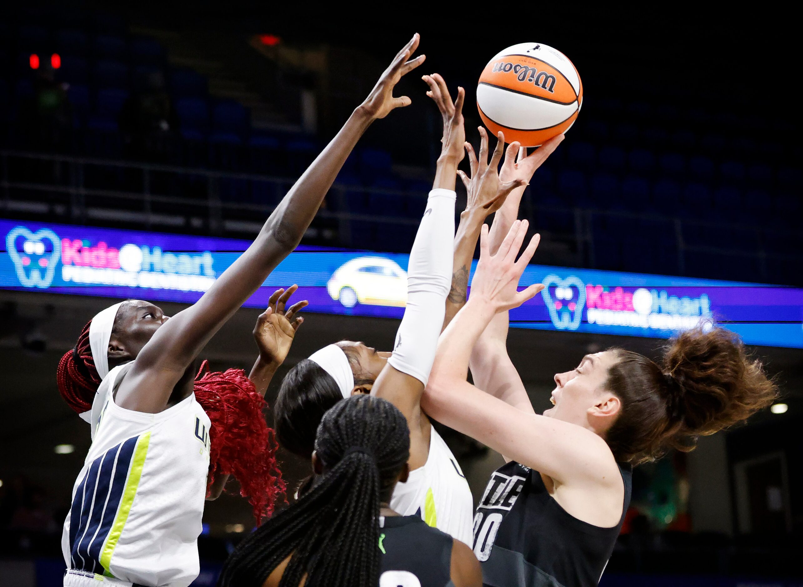 Seattle Storm forward Breanna Stewart (30) puts up a shot over Dallas Wings center Awak...