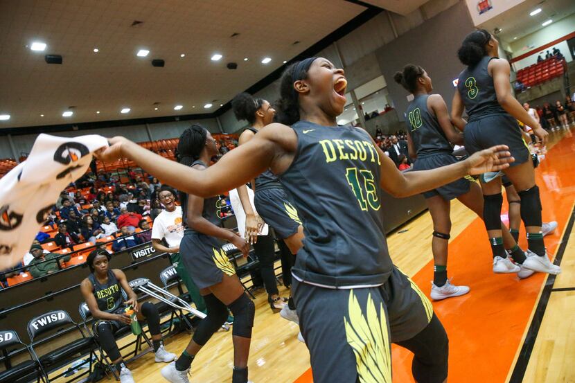 DeSoto guard Michayla Gatewood (15) celebrates after her team beat South Grand Prairie in...